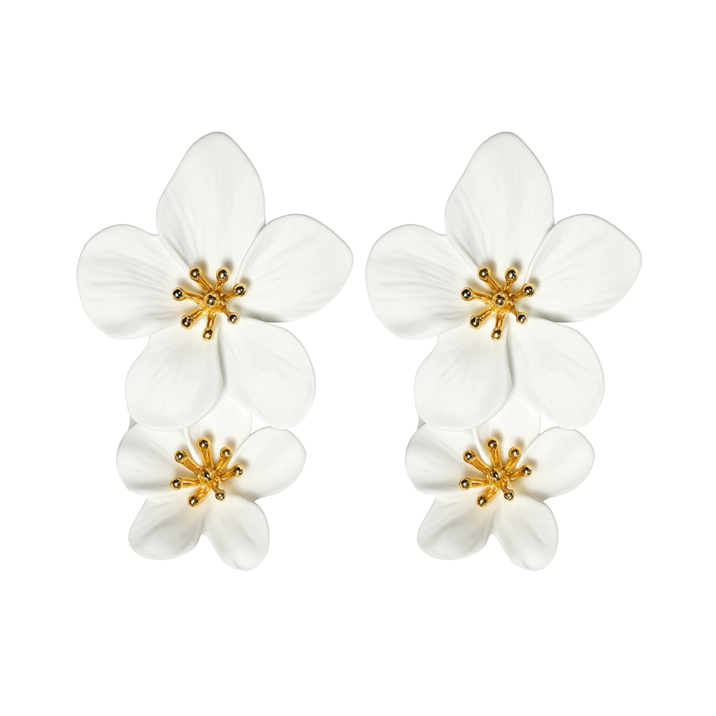 Pair of white flower-shaped earrings with gold centers on a white background