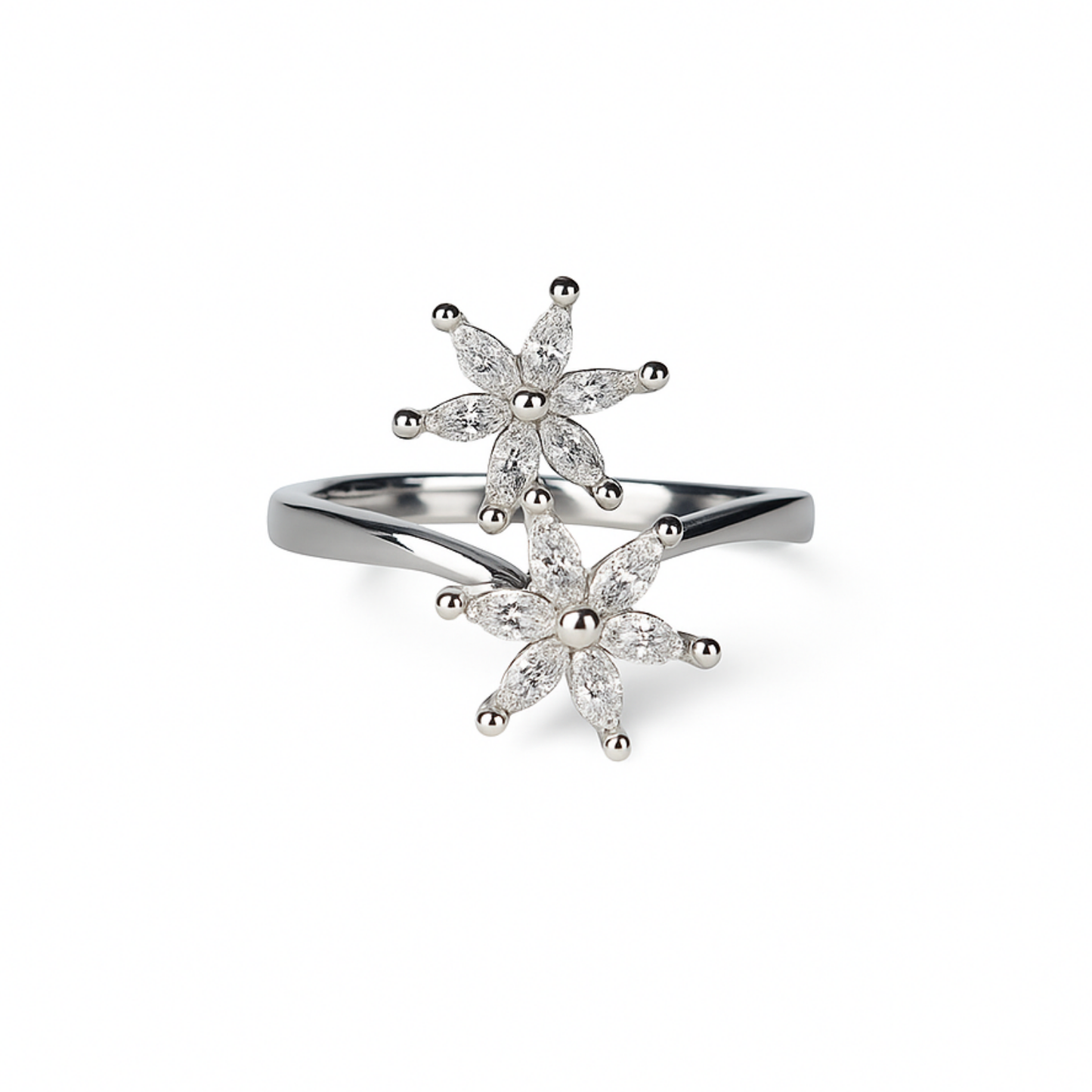 Silver ring with floral designs on a white background