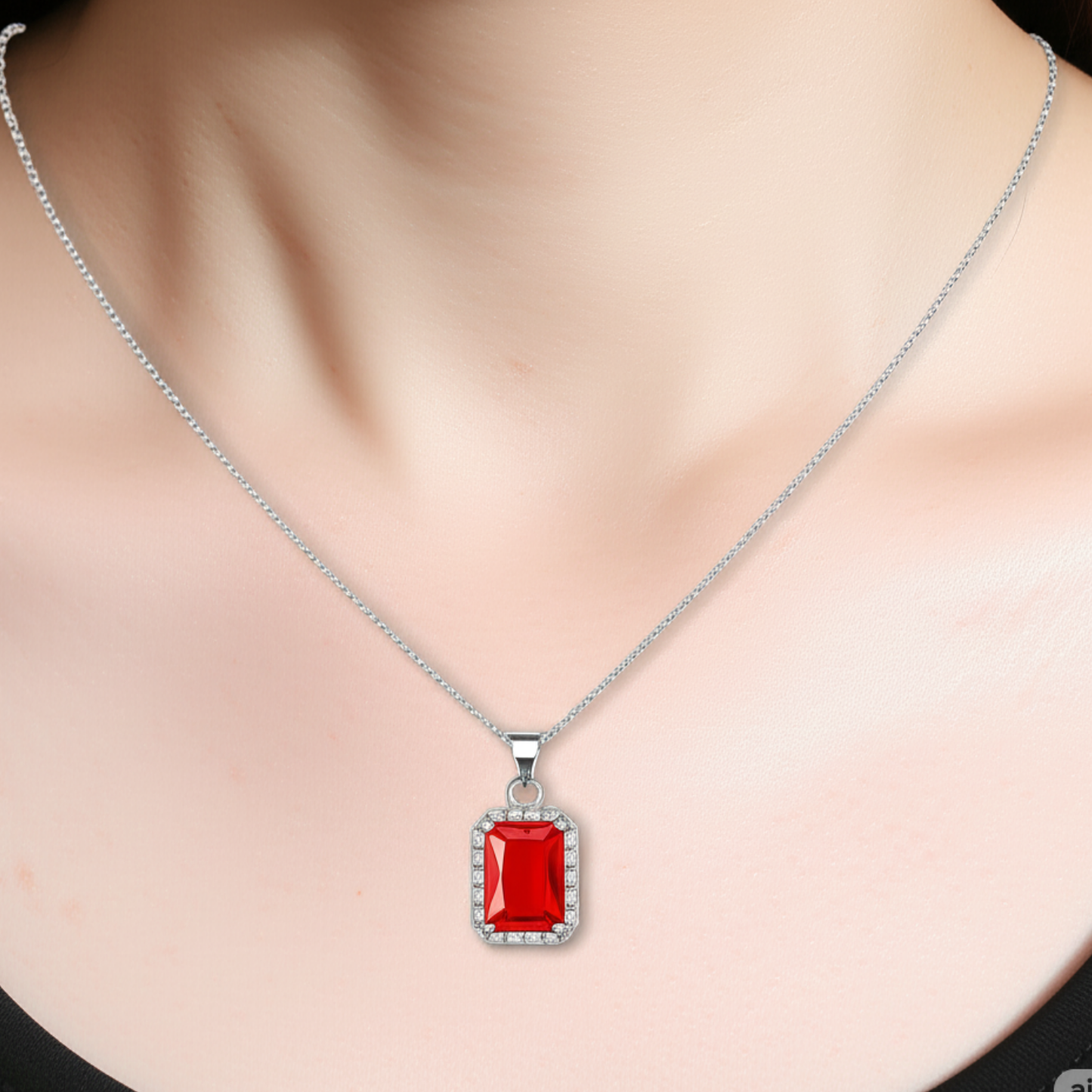 Necklace with a red pendant on a mannequin