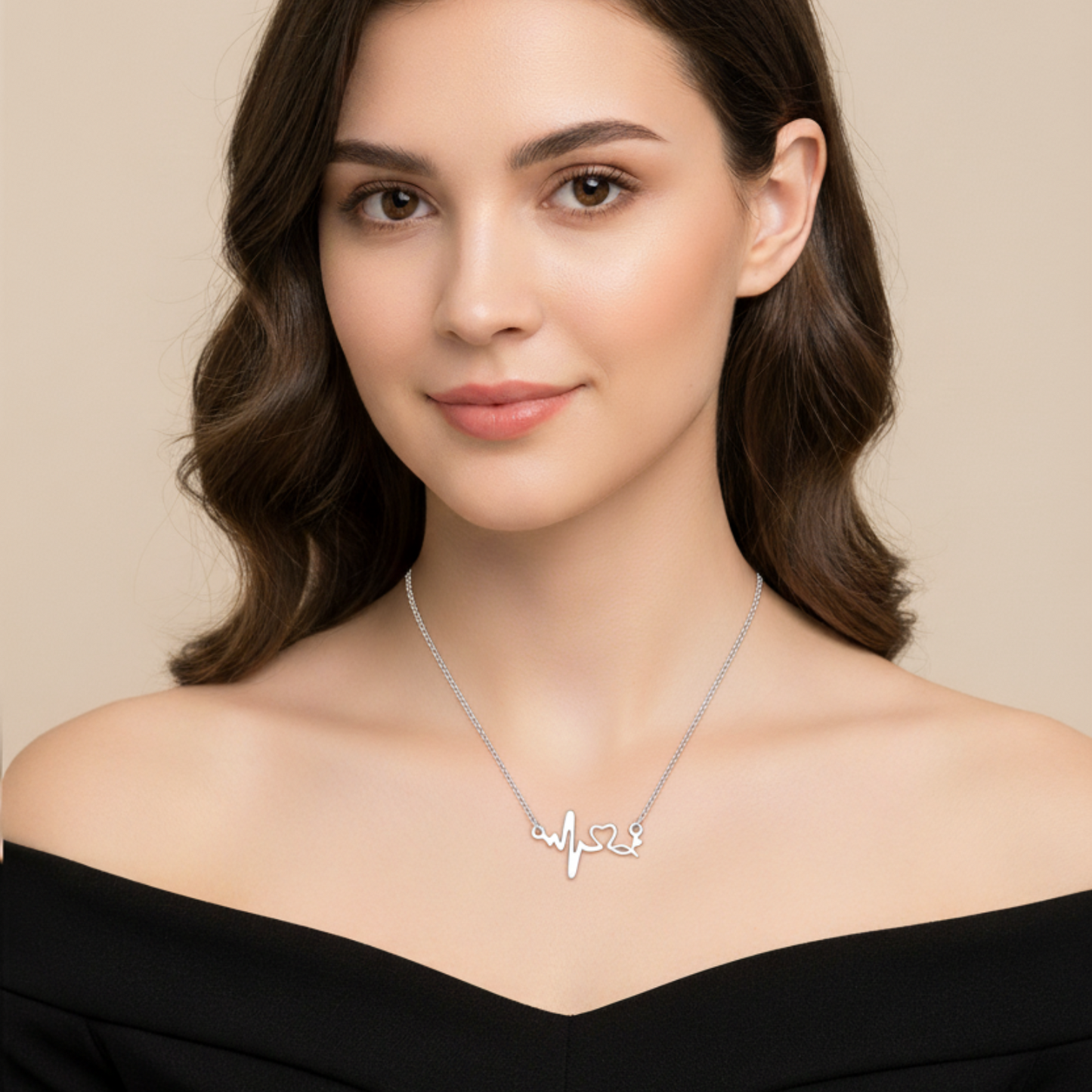 Woman wearing a silver necklace with a heart-shaped pendant on a beige background