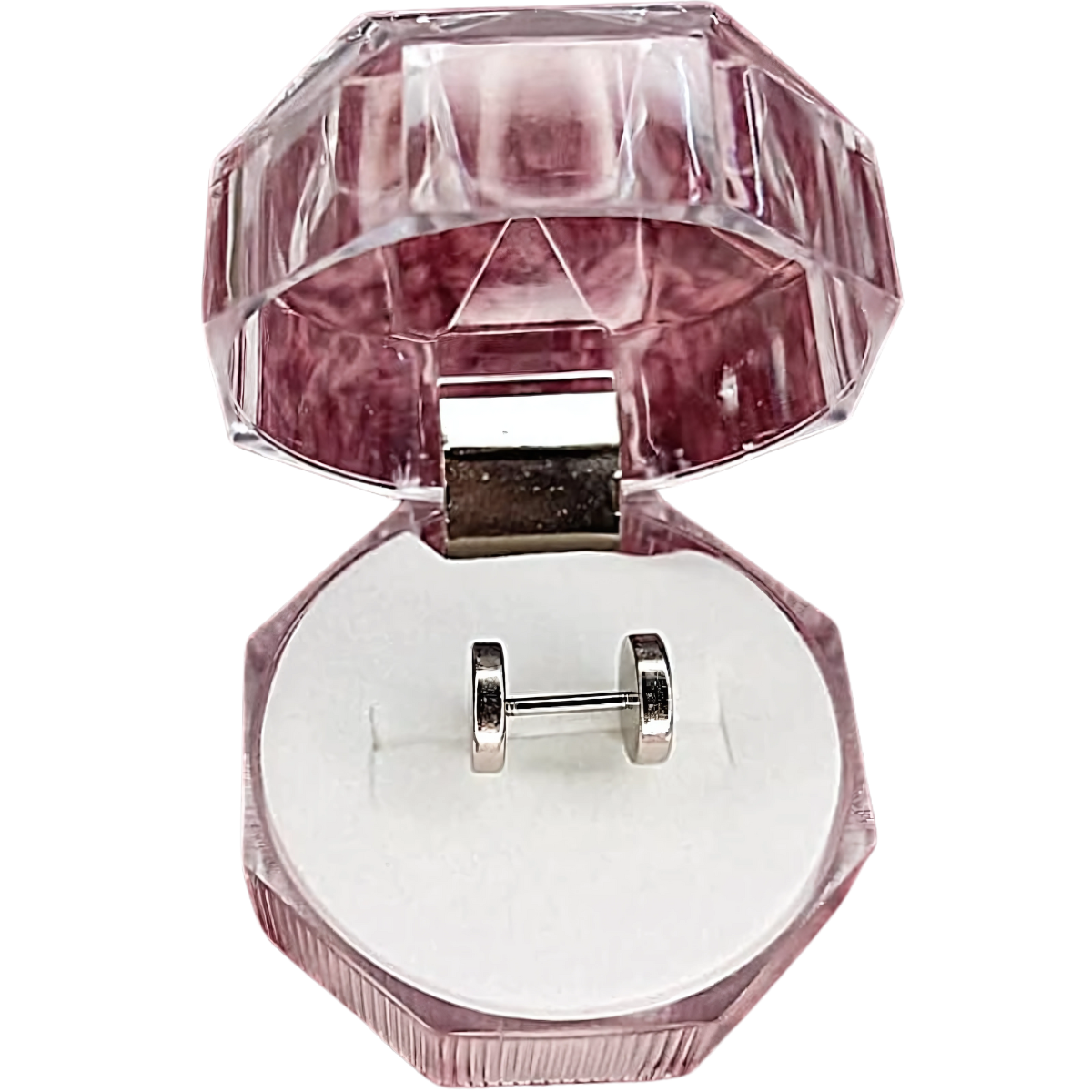 Silver stud in a pink jewelry box on a white background