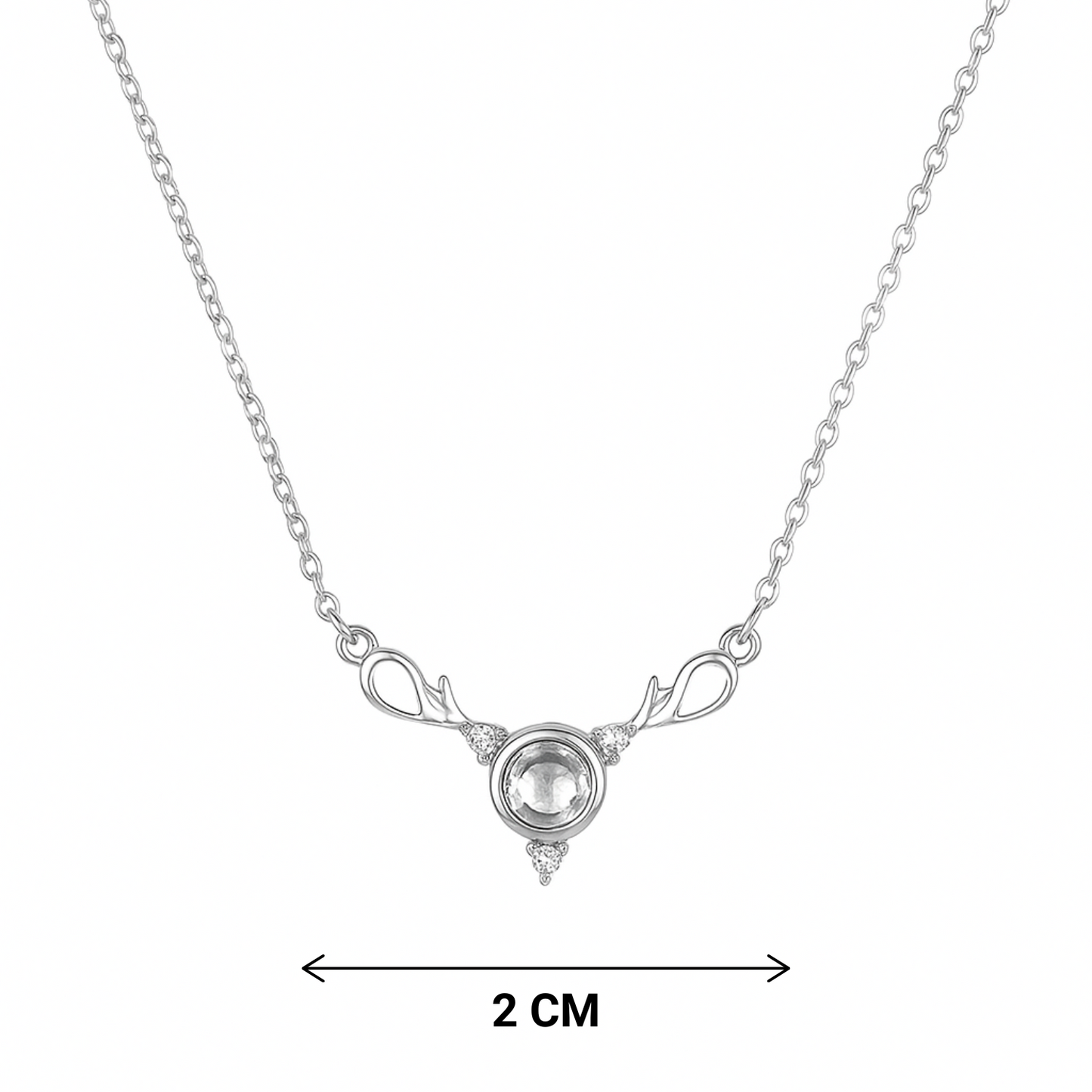 Silver necklace with a circular pendant on a white background