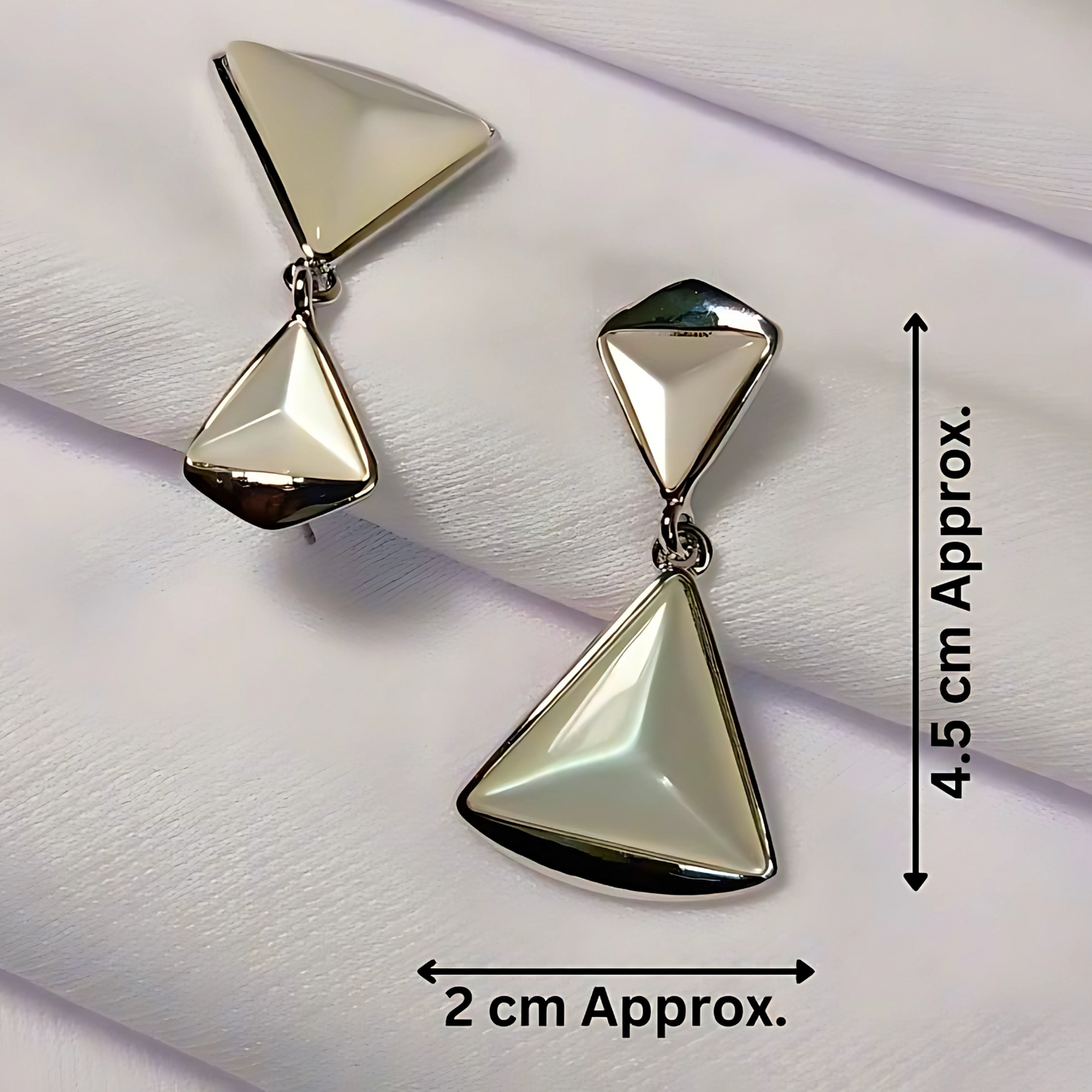 Gold triangle-shaped earrings with measurements on a white background