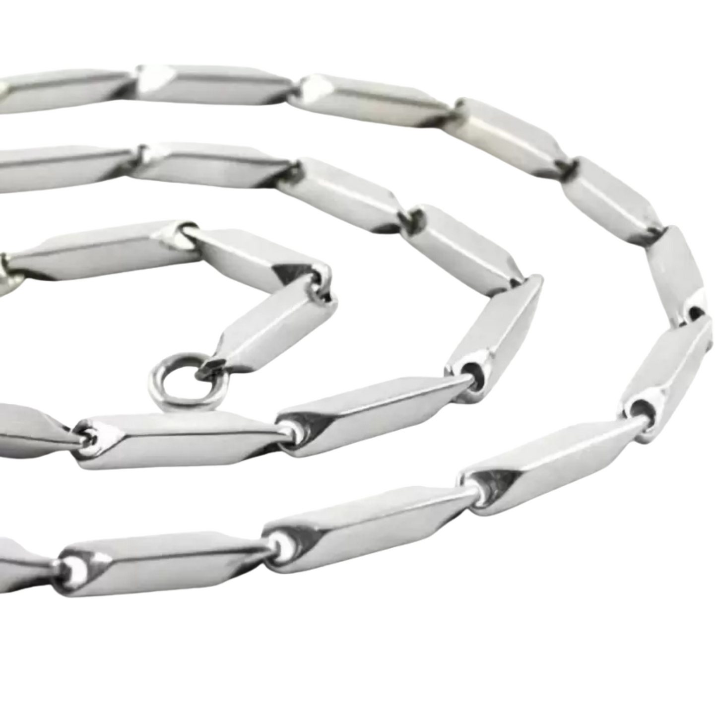 Silver chain necklace on a white background