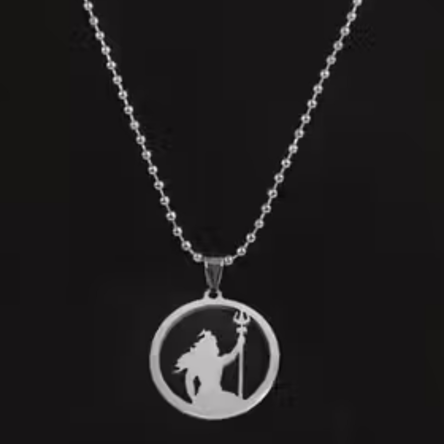 Silver necklace with a pendant featuring a warrior design on a black background