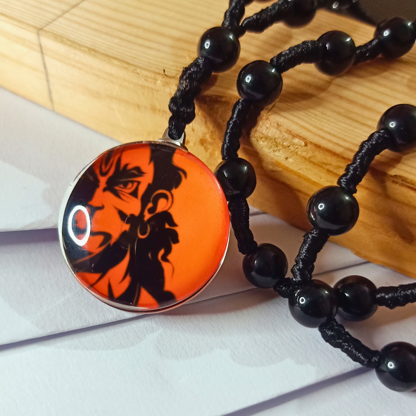 Black thread and beads glass pendant lord hanuman