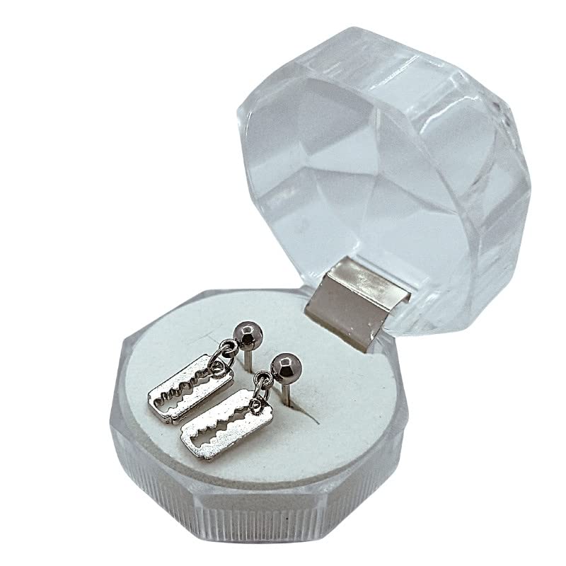 Silver earrings in a hexagonal crystal jewelry box on a white background