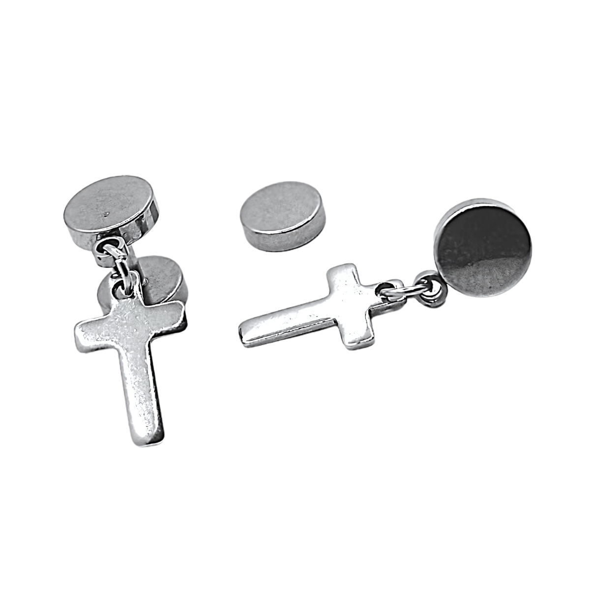Pair of silver cross earrings on a white background