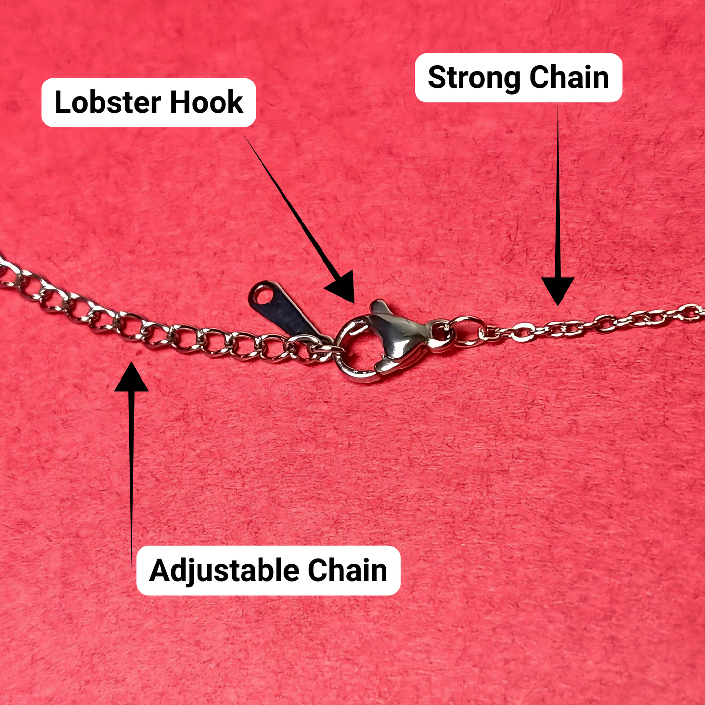 Chain necklace with labeled lobster hook, strong chain, and adjustable chain on a pink background