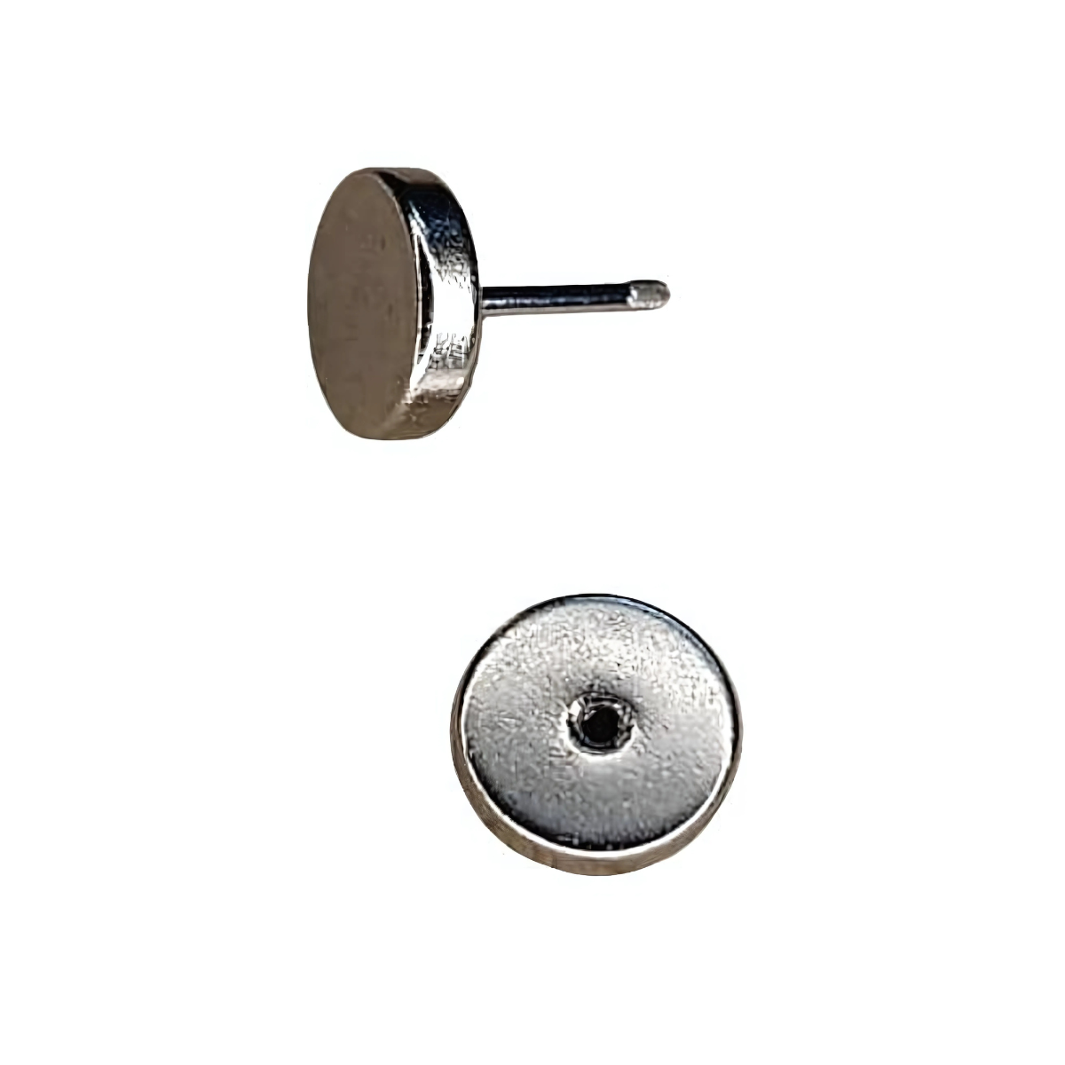 Silver round earring on a white background