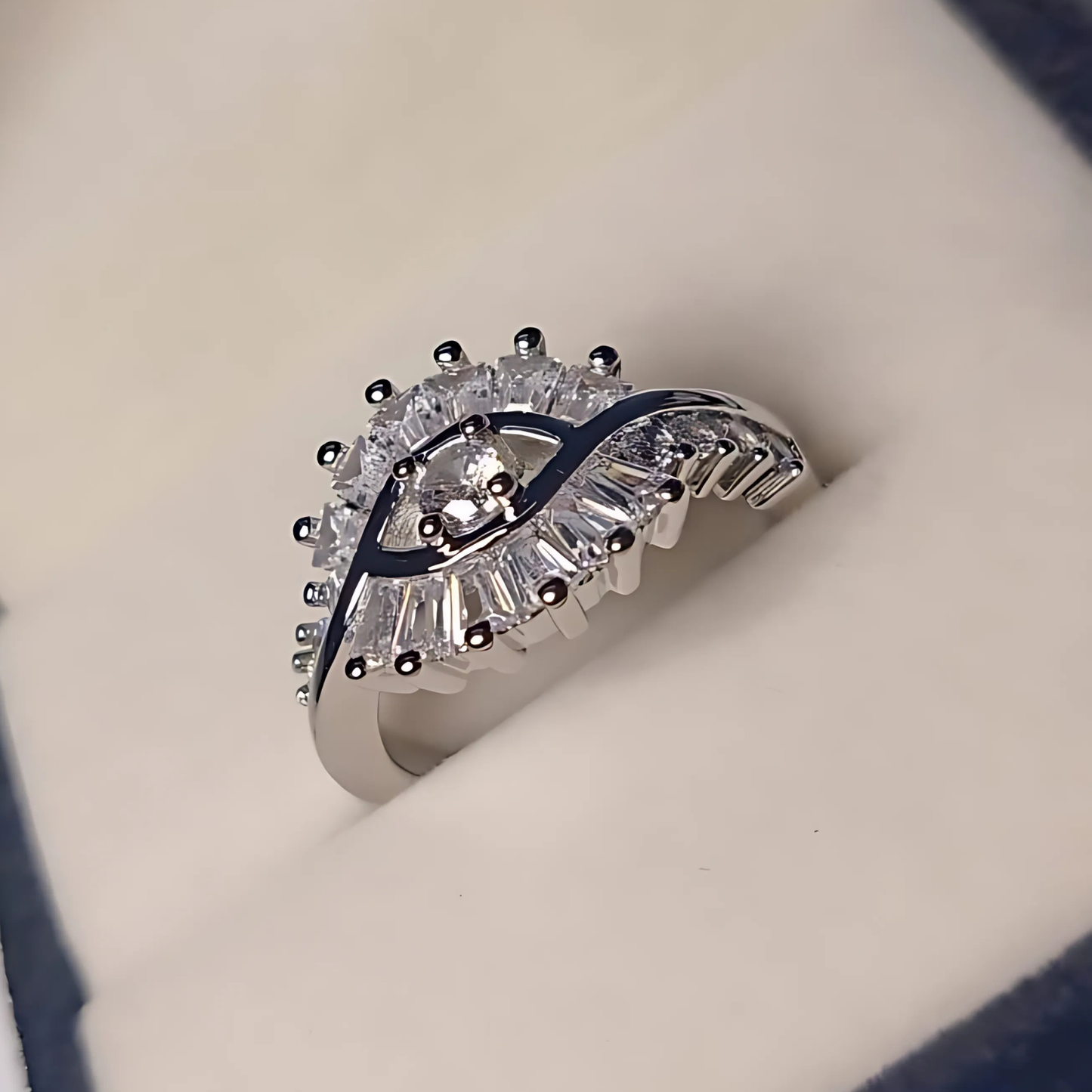 Diamond ring with a unique design on a soft beige background