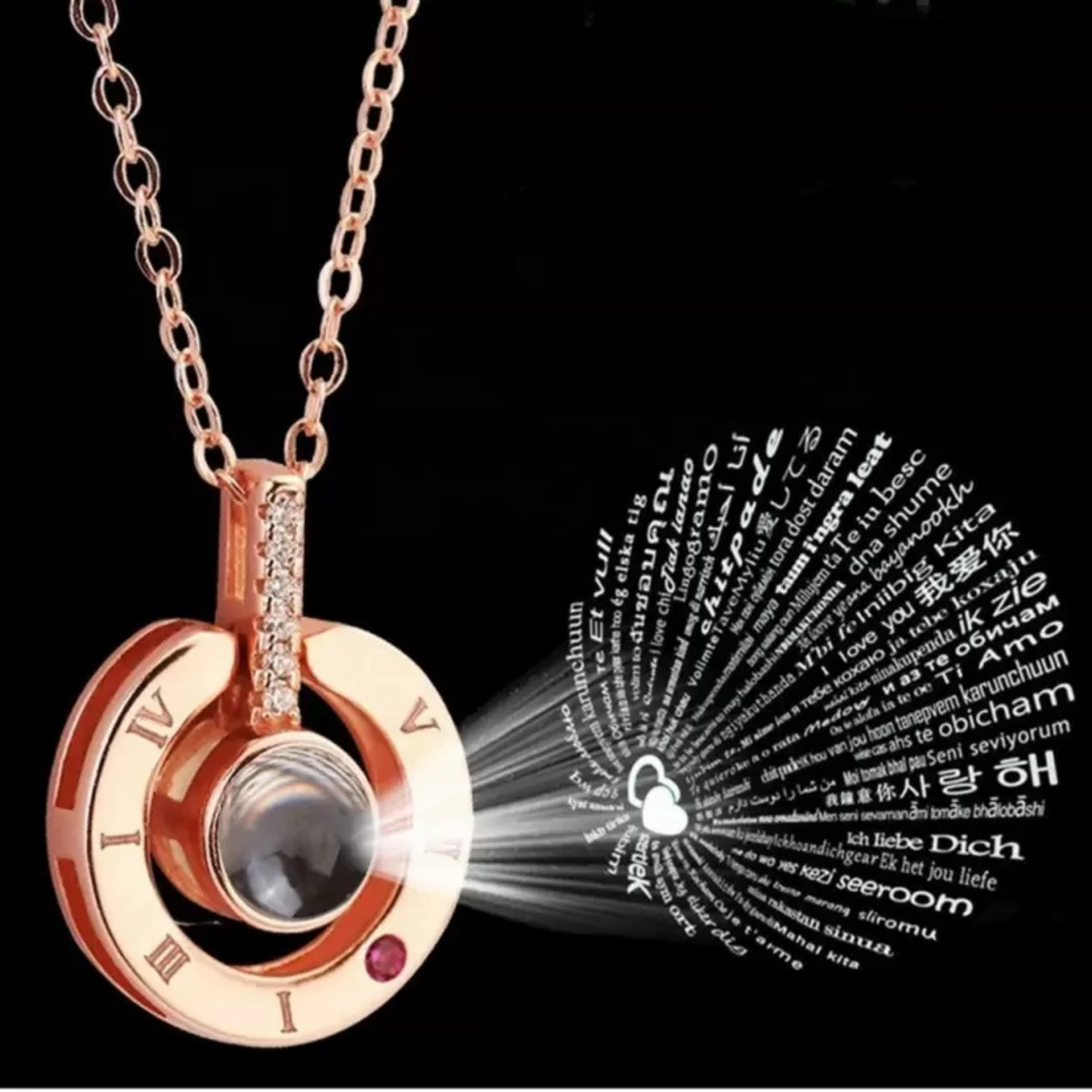 Rose gold necklace with a pendant projecting text onto a black background