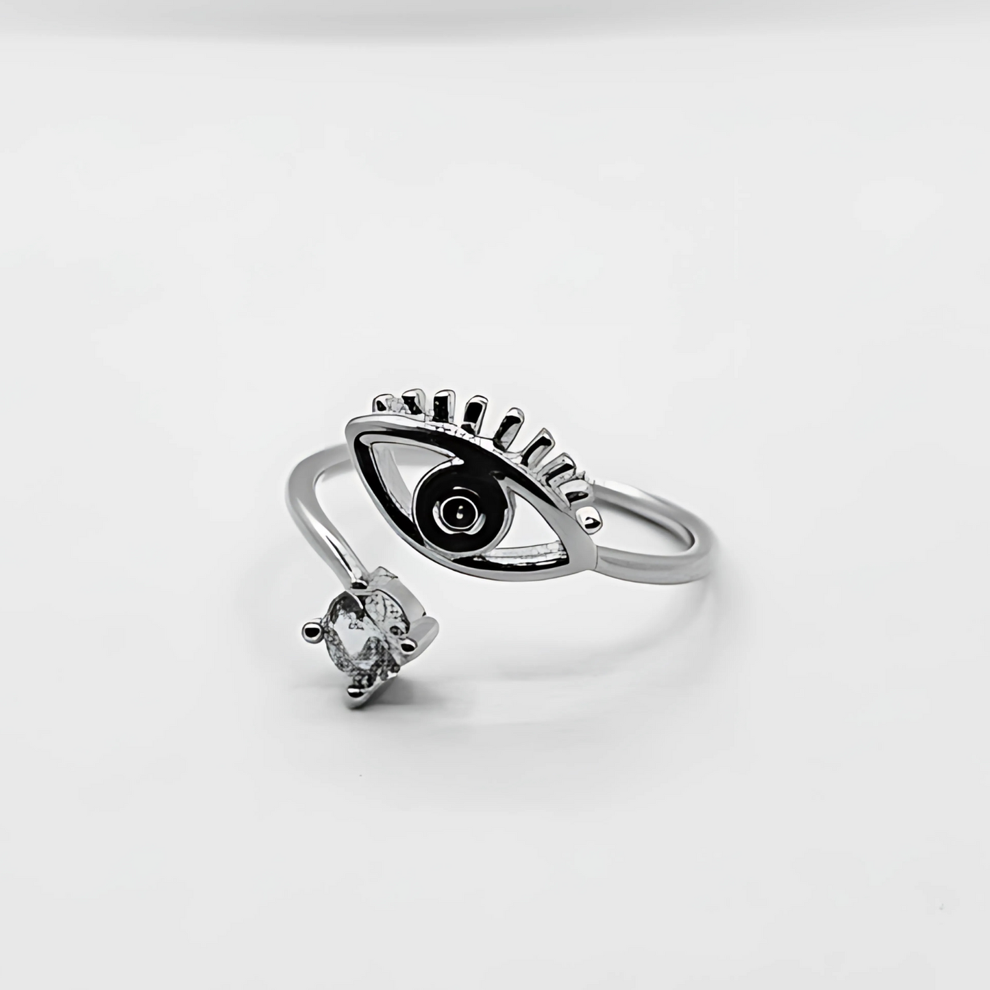 Stylish eye black and small diamond ring silver color on white background