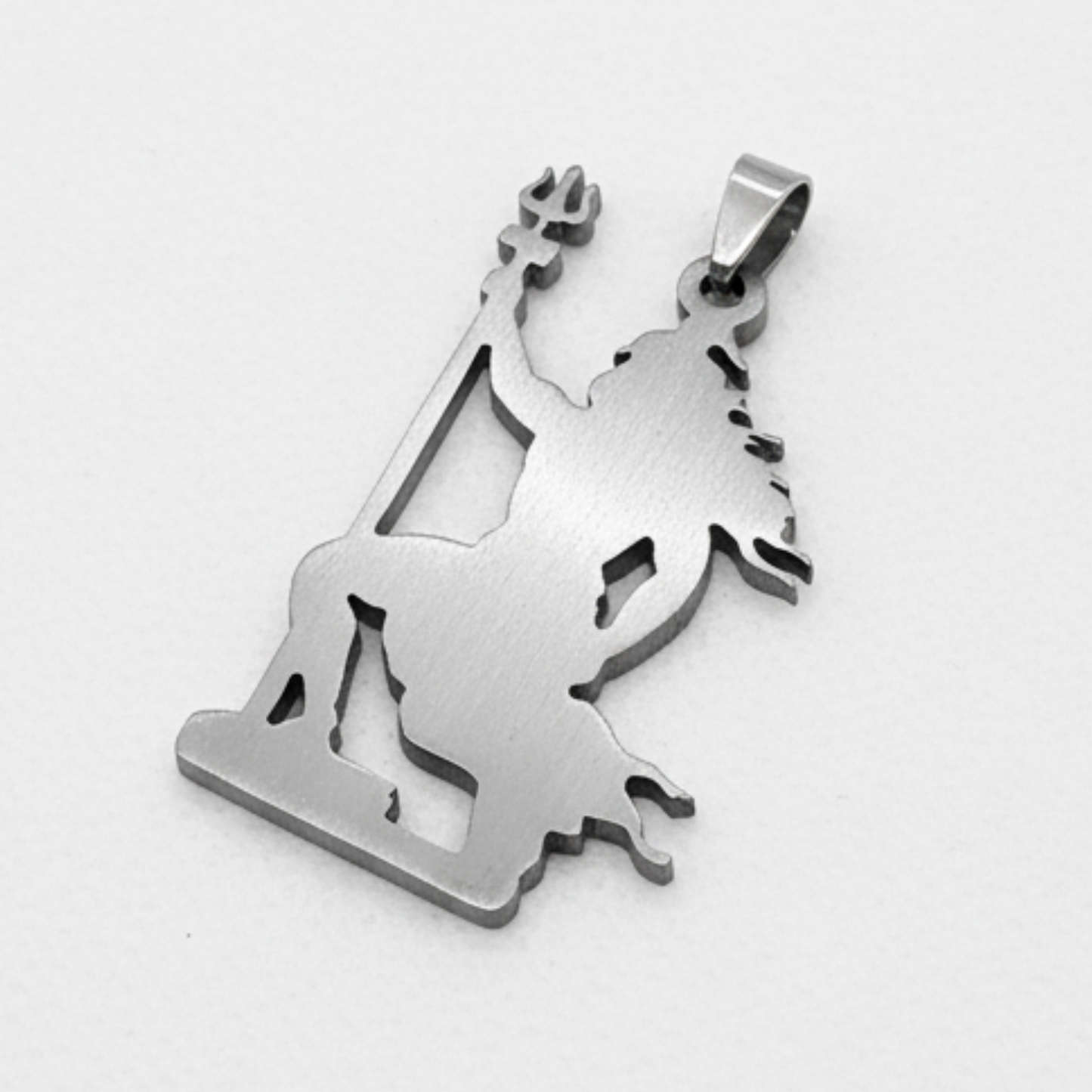 Silver pendant of a shiv or trishul on a white background