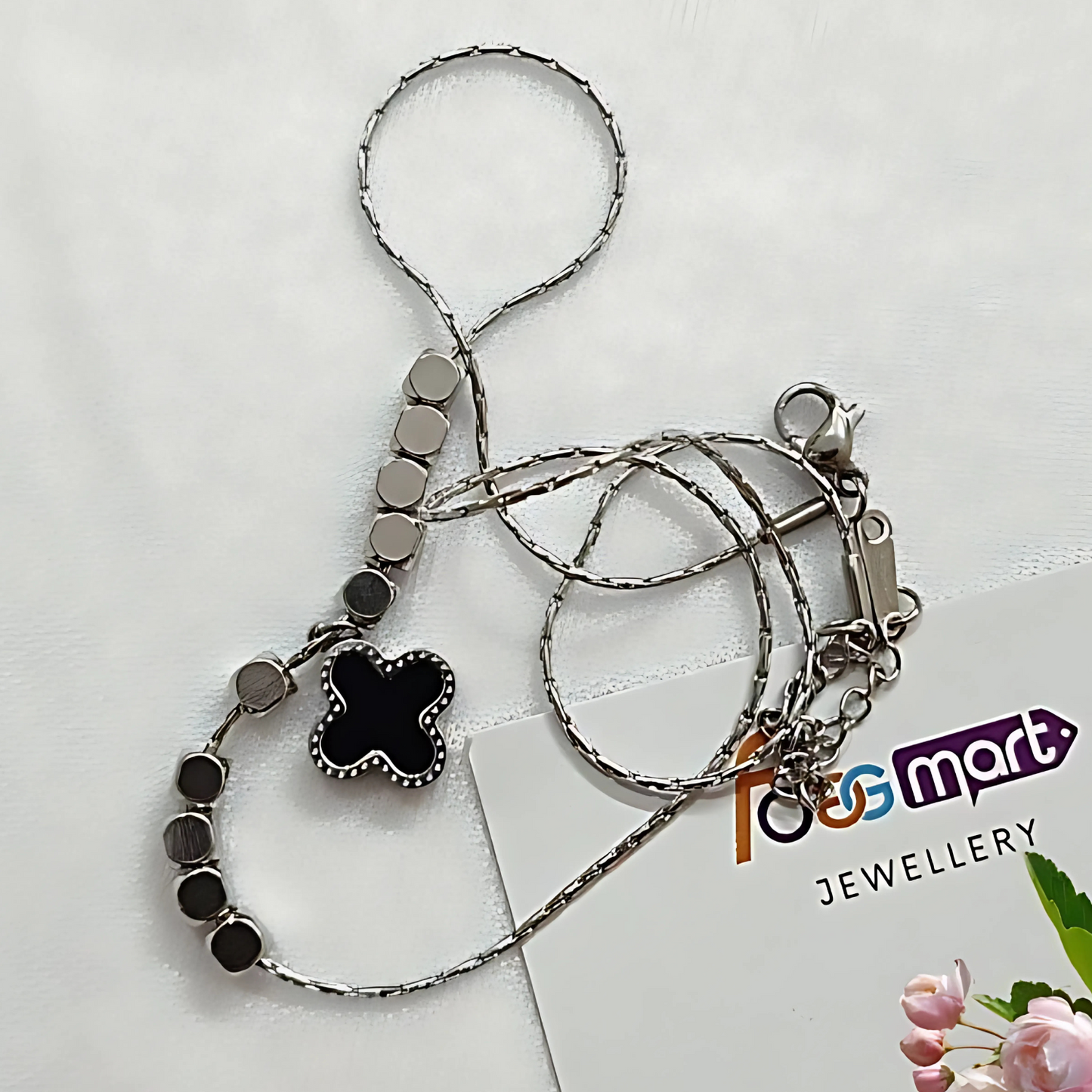Silver keychain with black butterfly charm on a white background with 'Foggmart' branding.