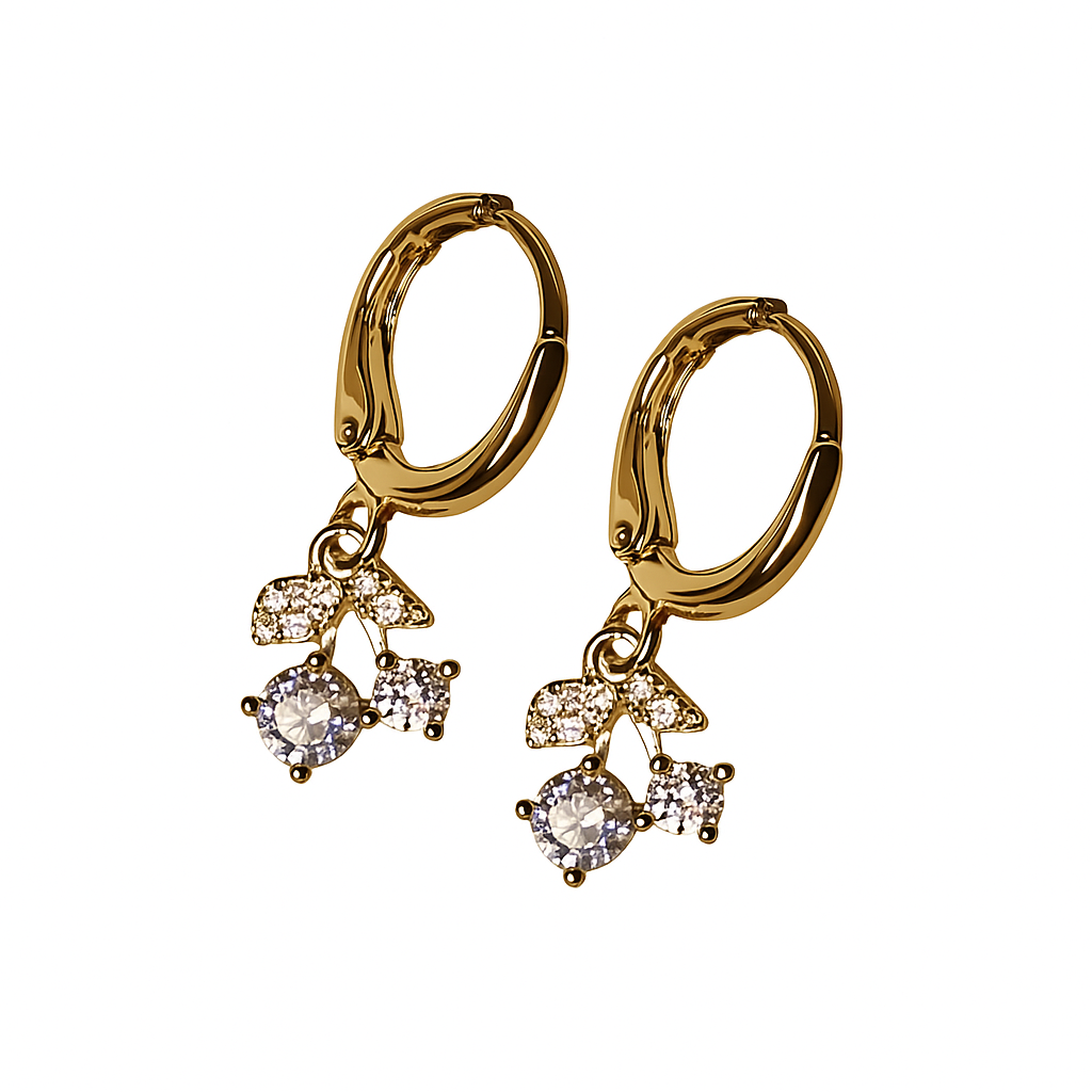 Silver hoop earrings with diamond-like charms on a white background