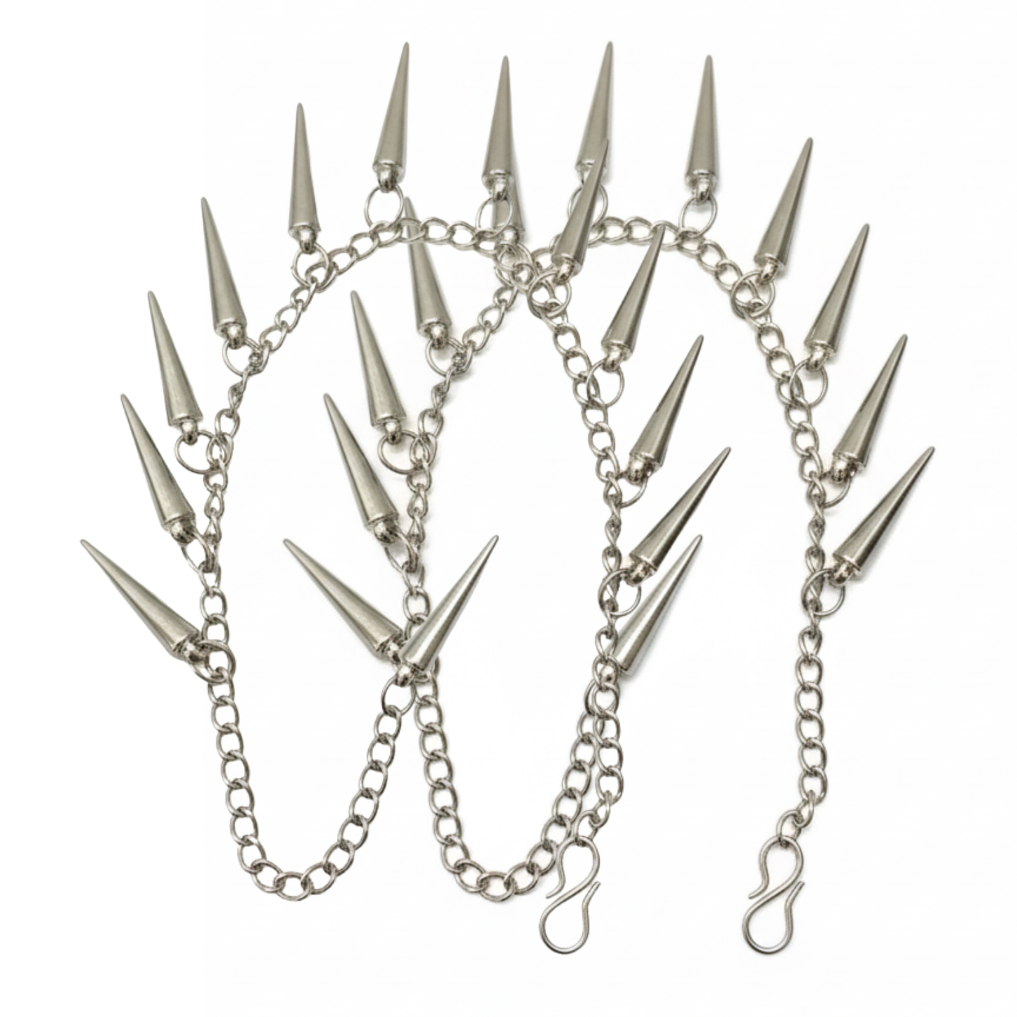 Silver chain with spike attachments on a white background