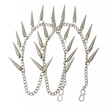 Silver chain with spike attachments on a white background