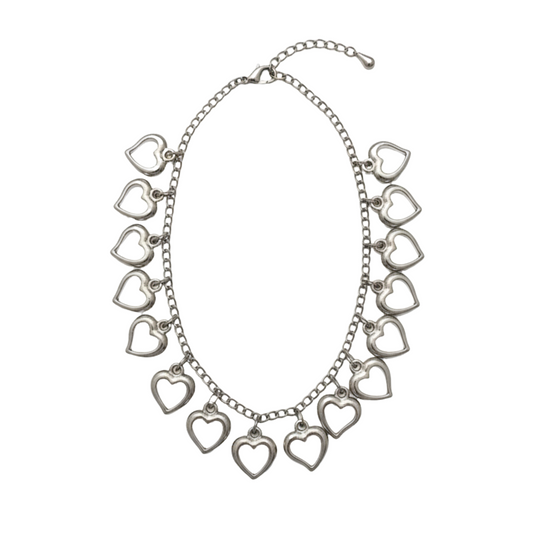 Silver necklace with heart-shaped pendants on a white background