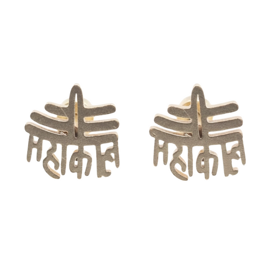 Pair of gold earrings with intricate design on a white background