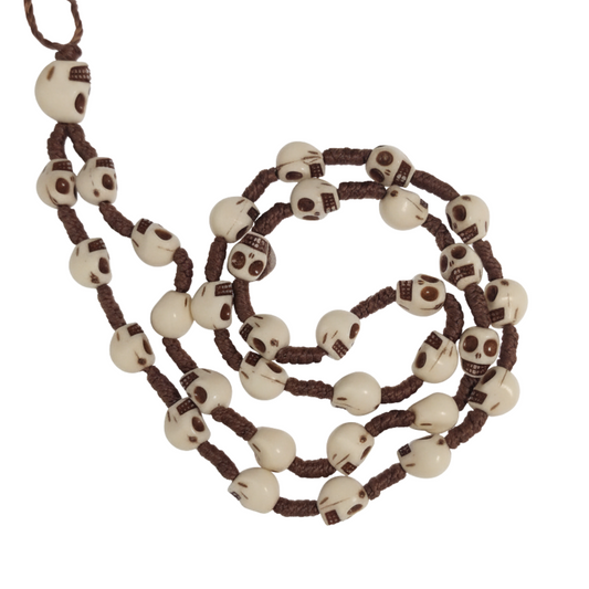Necklace with skull-shaped beads on a white background