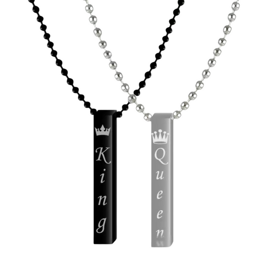 Two necklaces with 'King' and 'Queen' pendants on black and silver beaded chains.