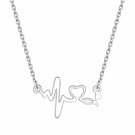 Silver necklace with heart and heartbeat line design on a white background