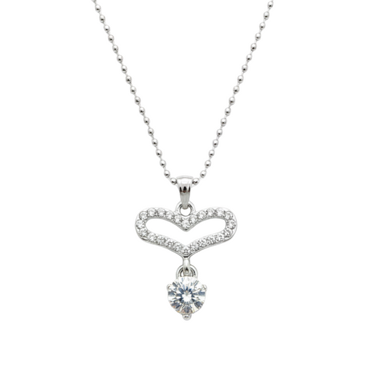 Silver necklace with a heart-shaped pendant on a white background