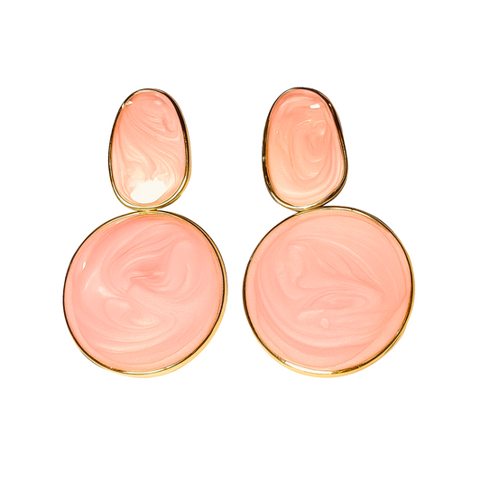 Pair of pink earrings with gold accents on a white background