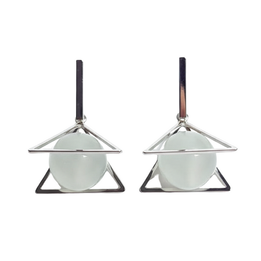 Pair of earrings with geometric design on a white background