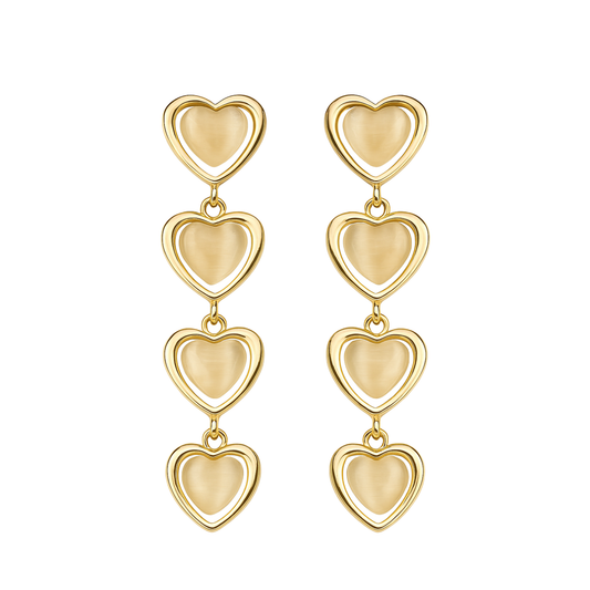 Gold heart-shaped earrings on a white background