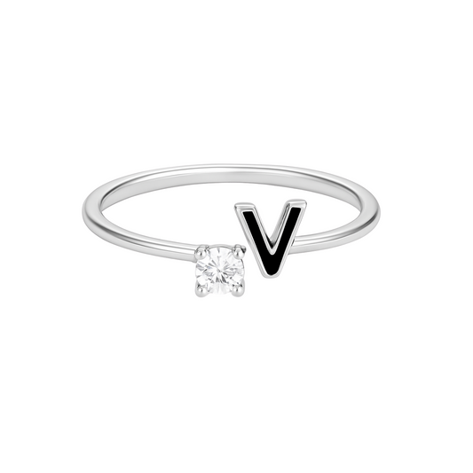 Silver ring with a diamond and letter 'V' on a white background