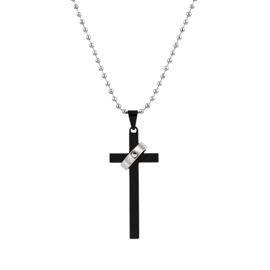 Black cross pendant with a silver accent on a chain against a white background