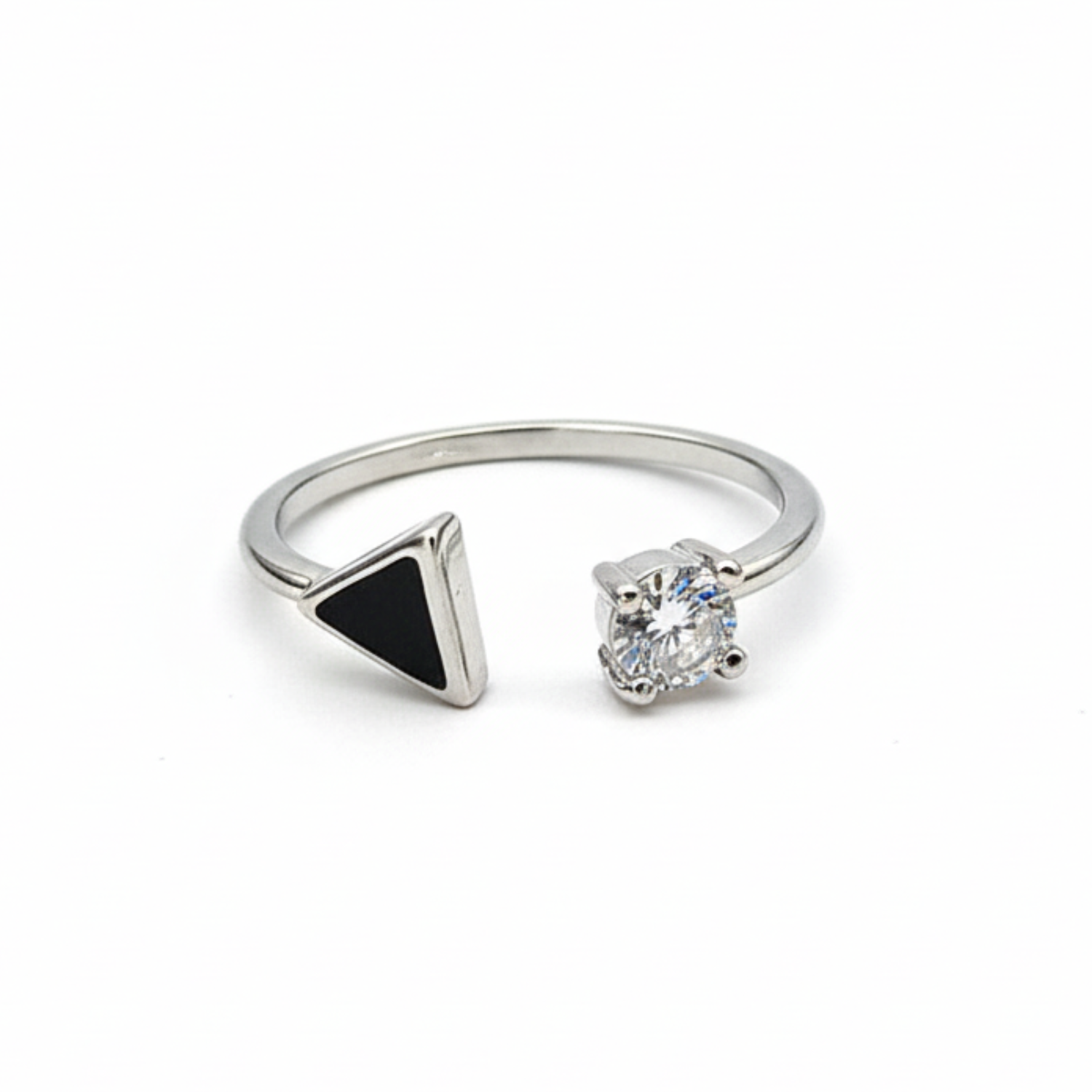 Two rings with a black triangle and clear gemstone on a white background