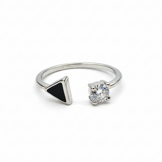 Two rings with a black triangle and clear gemstone on a white background