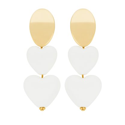 Gold and white heart-shaped earrings on a white background