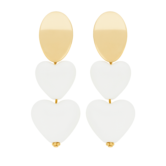 Gold and white heart-shaped earrings on a white background