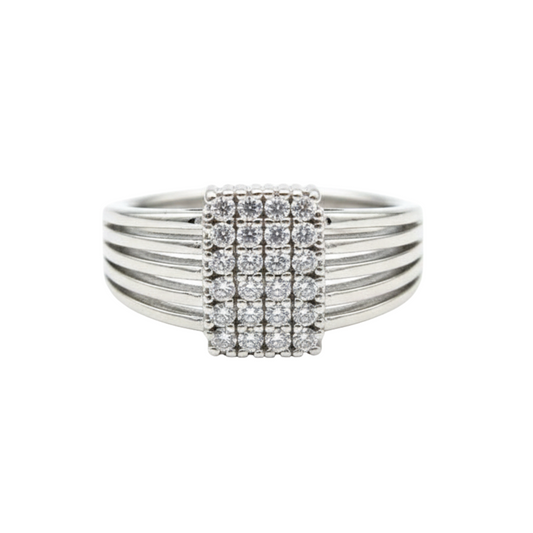 Silver ring with diamond accents on a white background