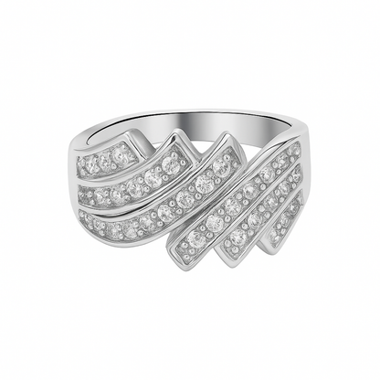 Silver ring with diamond accents on a white background