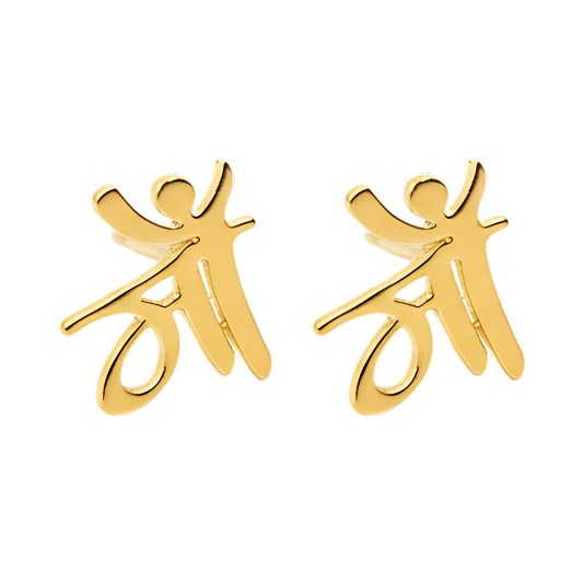 Gold abstract earrings on a white background