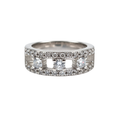 Silver ring with embedded diamonds on a white background