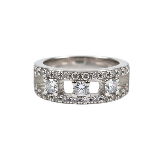 Silver ring with embedded diamonds on a white background