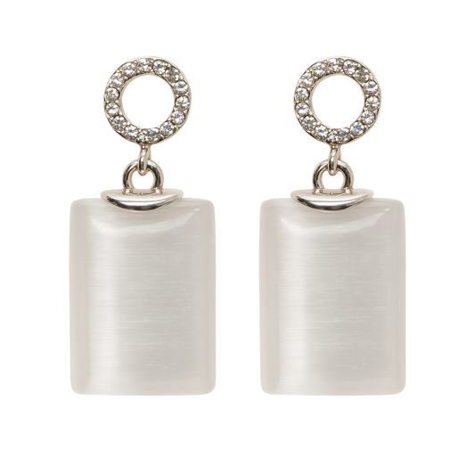 Pair of earrings with square white stones and circular top elements on a white background