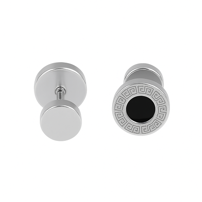 Pair of silver cufflinks with one featuring a black center and intricate design on a white background