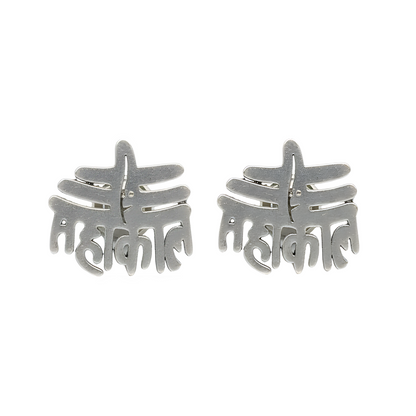 Pair of silver star-shaped earrings on a white background