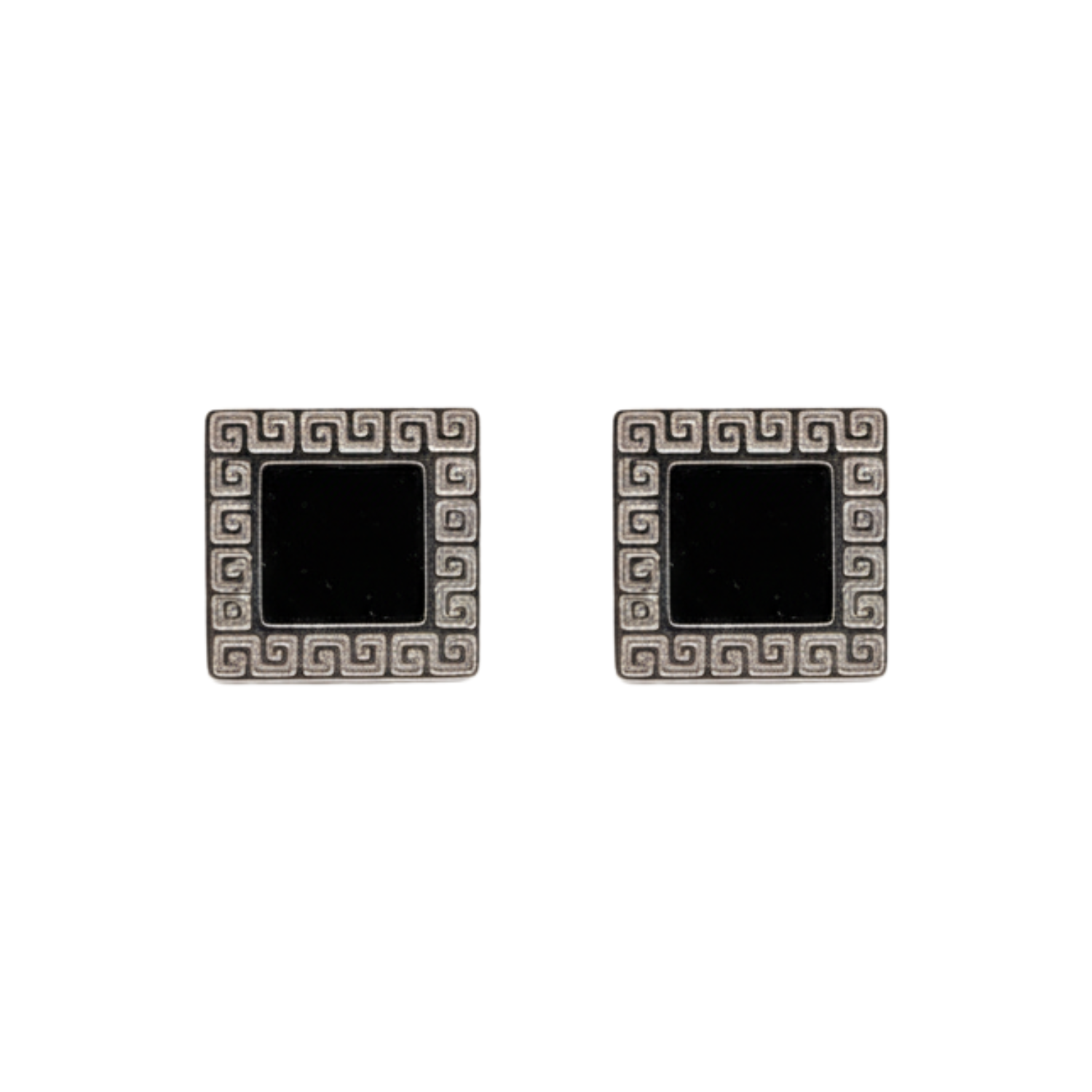 Pair of square earrings with black centers and decorative silver borders on a white background