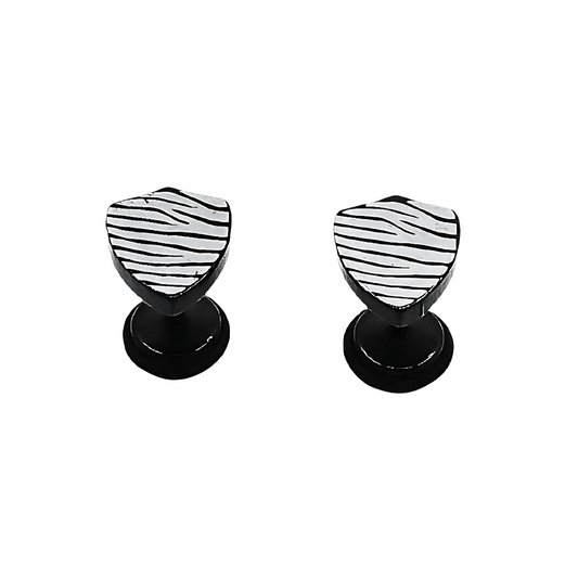 Pair of black and white striped earrings on a white background