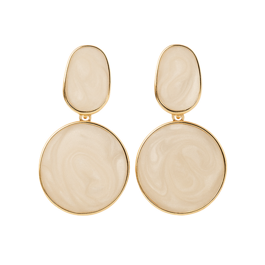 Pair of gold and beige earrings on a white background