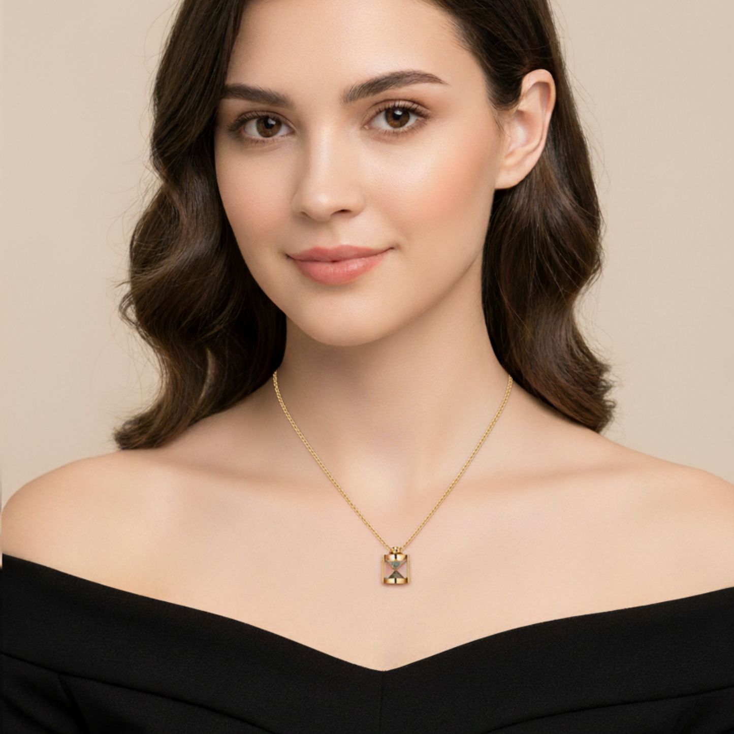Woman wearing a gold necklace against a beige background