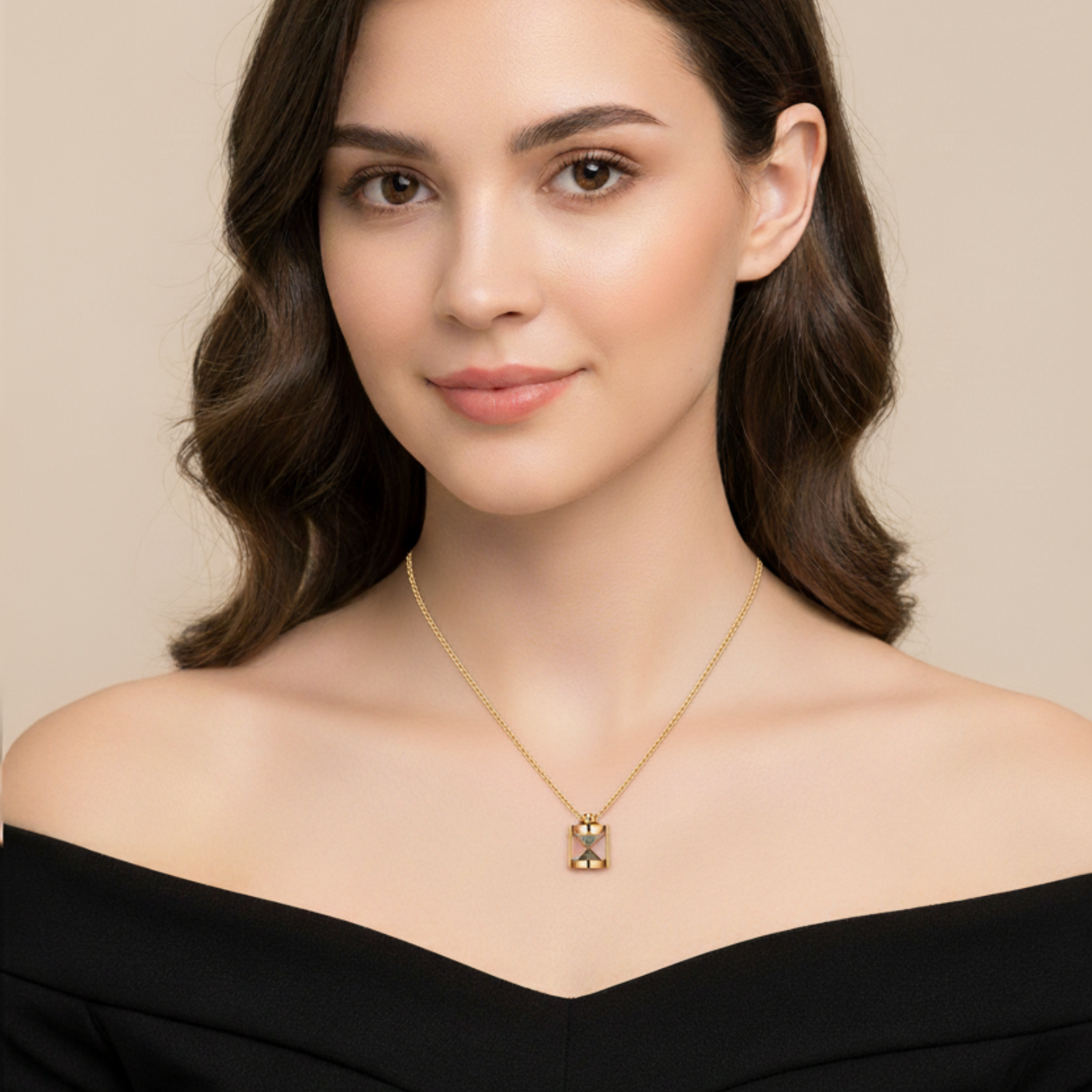 Woman wearing a gold necklace against a beige background